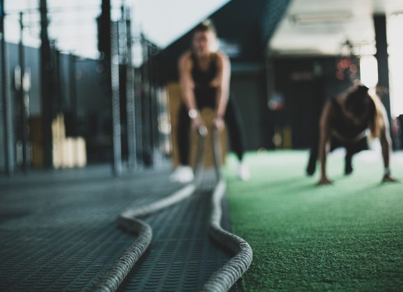 two person inside gym exercising