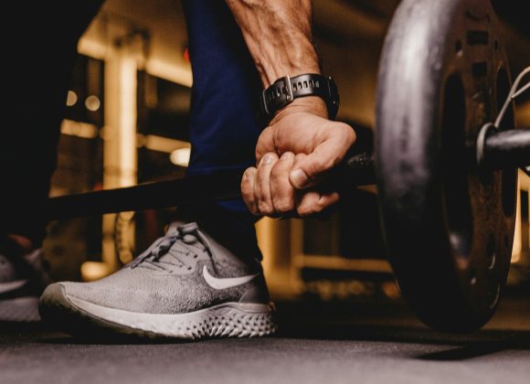 person about to lift barbell